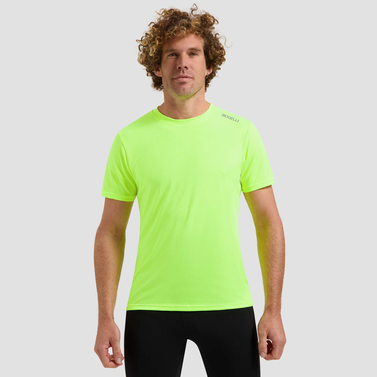 Rogelli Promo shirt korte mouw heren fluor gedragen voorkant.