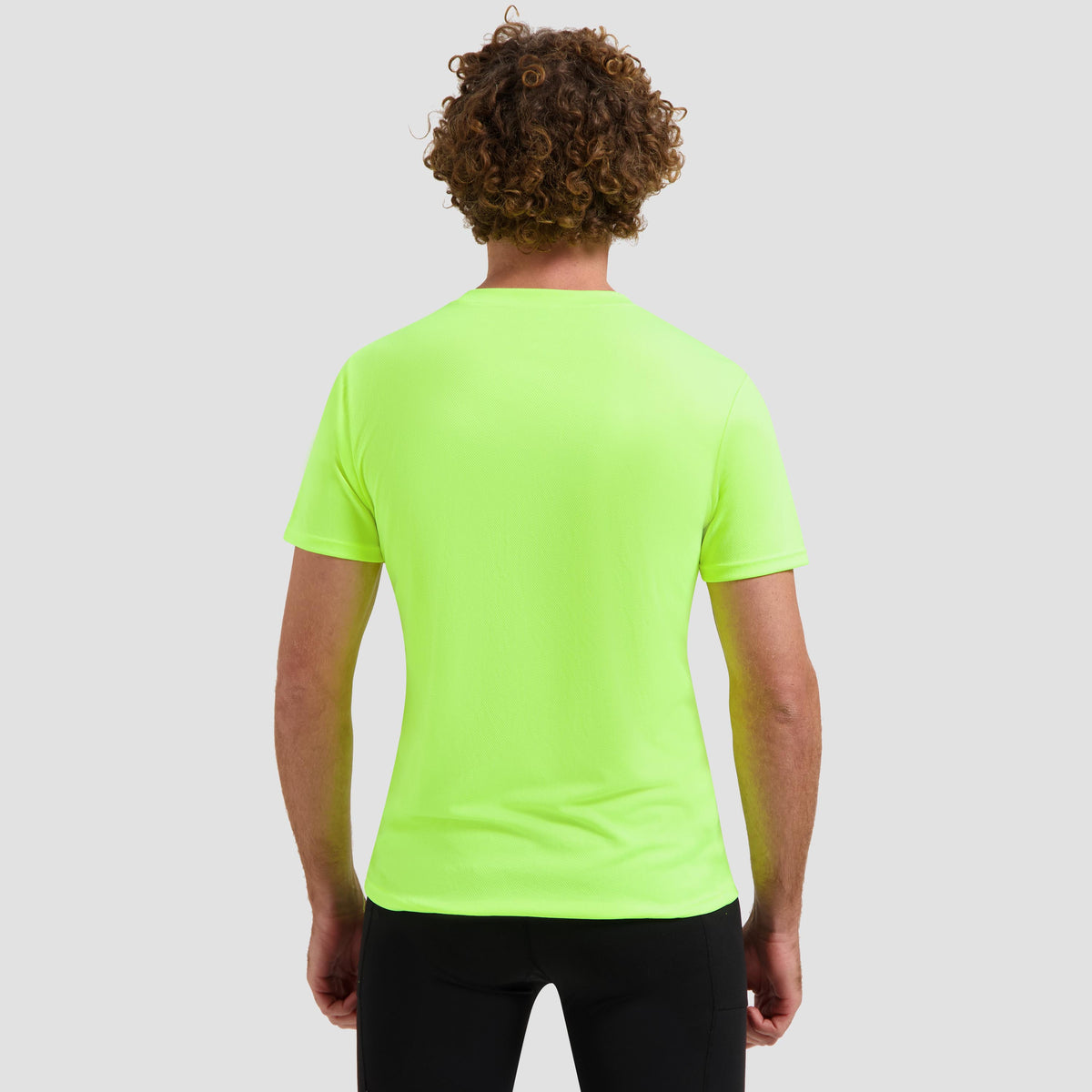 Rogelli Promo shirt korte mouw heren fluor gedragen achterkant.