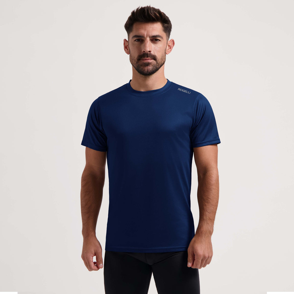 Rogelli Promo shirt korte mouw heren donkerblauw gedragen voorkant.