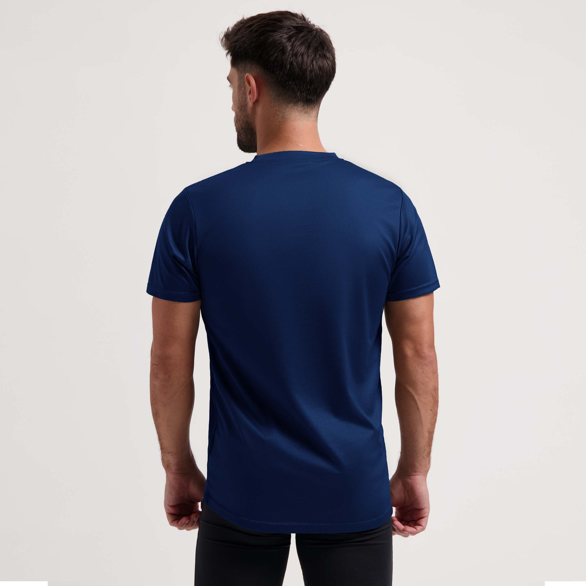 Rogelli Promo shirt korte mouw heren donkerblauw gedragen achterkant.
