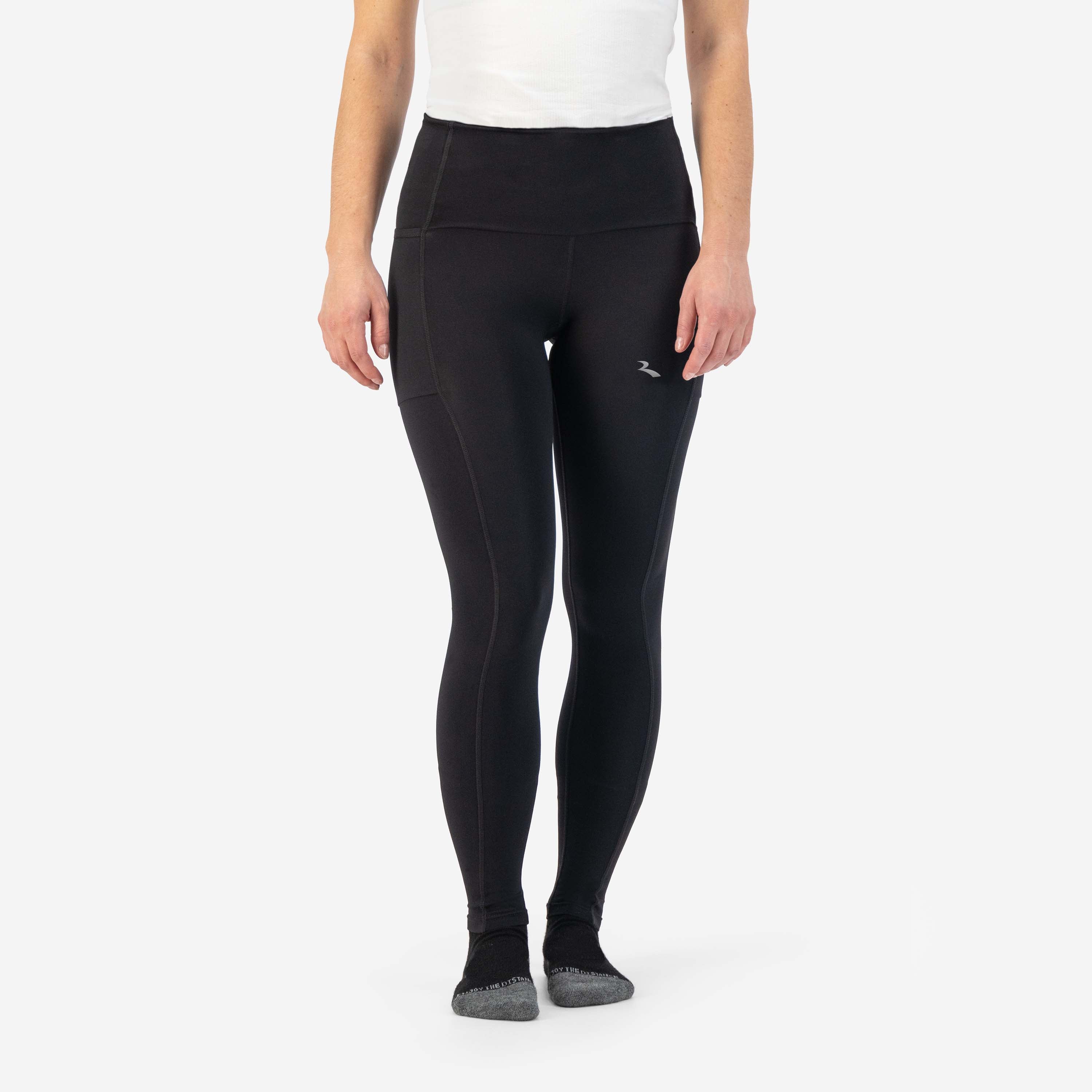 Rogelli Essential lange hardloopbroek dames zwart gedragen voorkant.