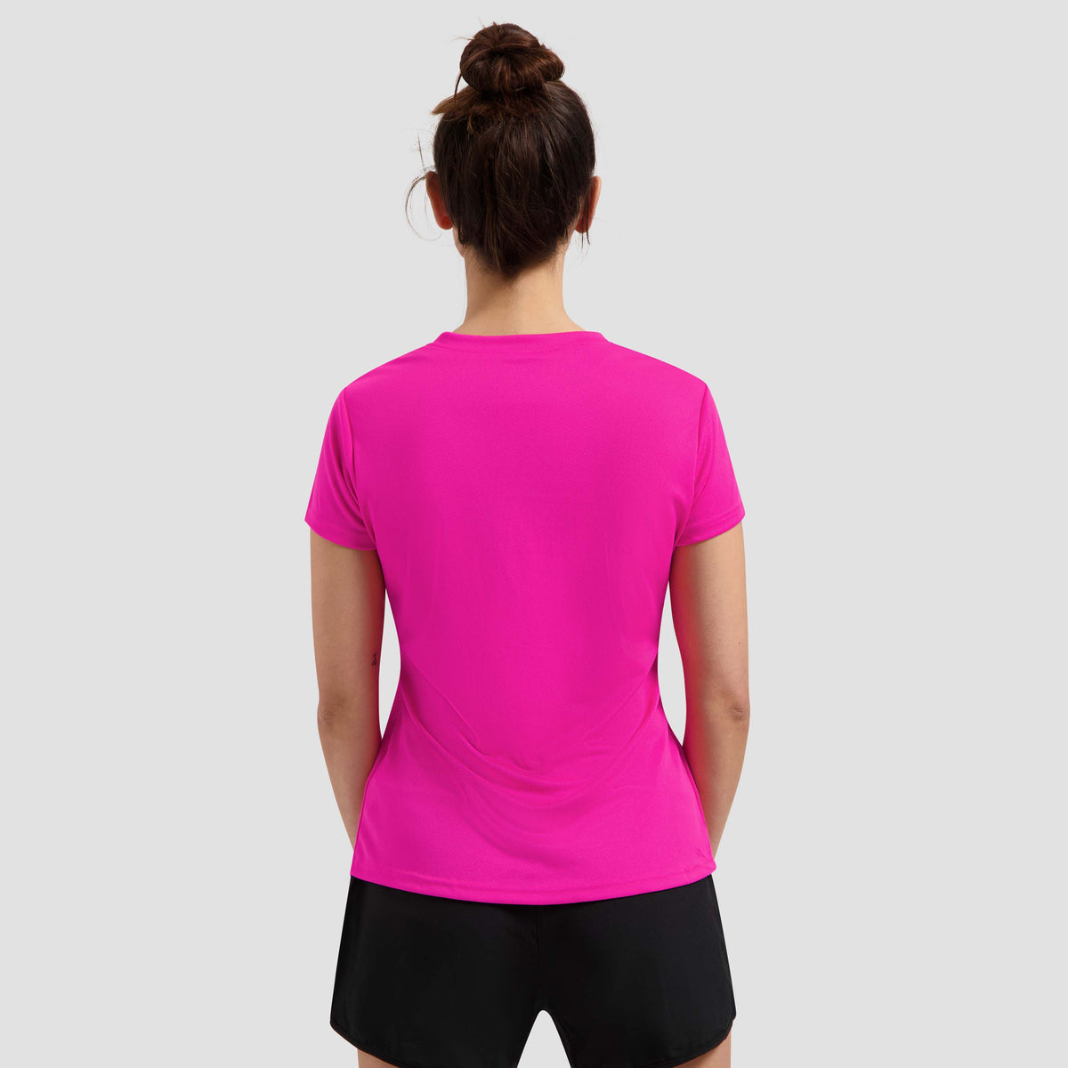Rogelli Promo shirt korte mouw dames roze gedragen achterkant.