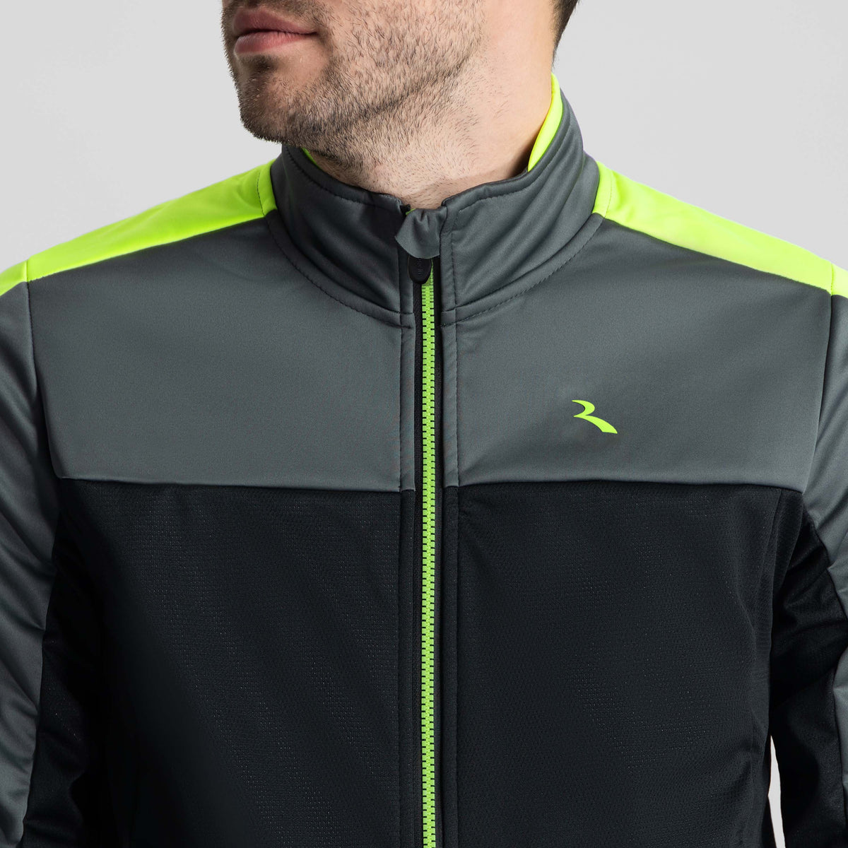 Detail van Rogelli Freeze fietsjack heren zwart en fluor voorkant.