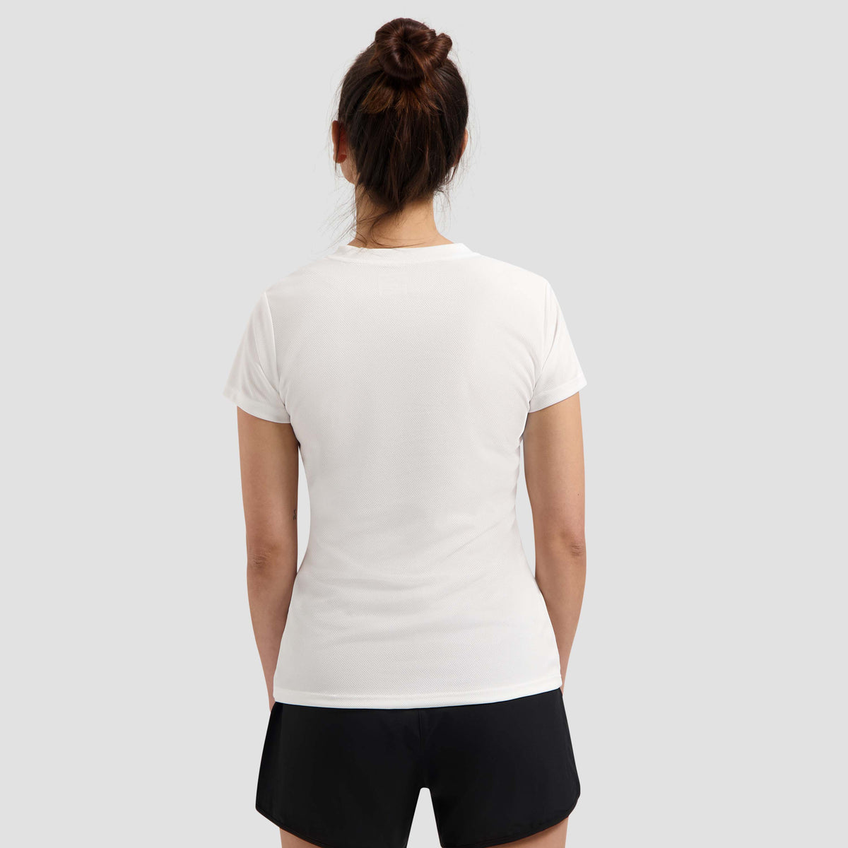 Rogelli Promo chemise Manches courtes Femme blanc usé au dos.