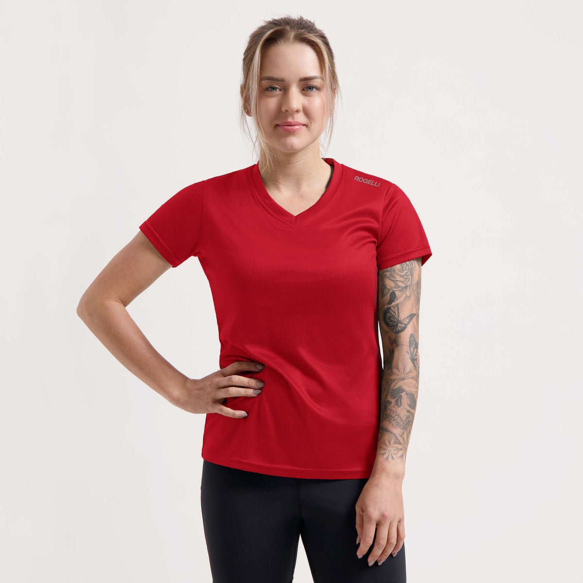 Rogelli Promo chemise Manches courtes Femme devant rouge usé.