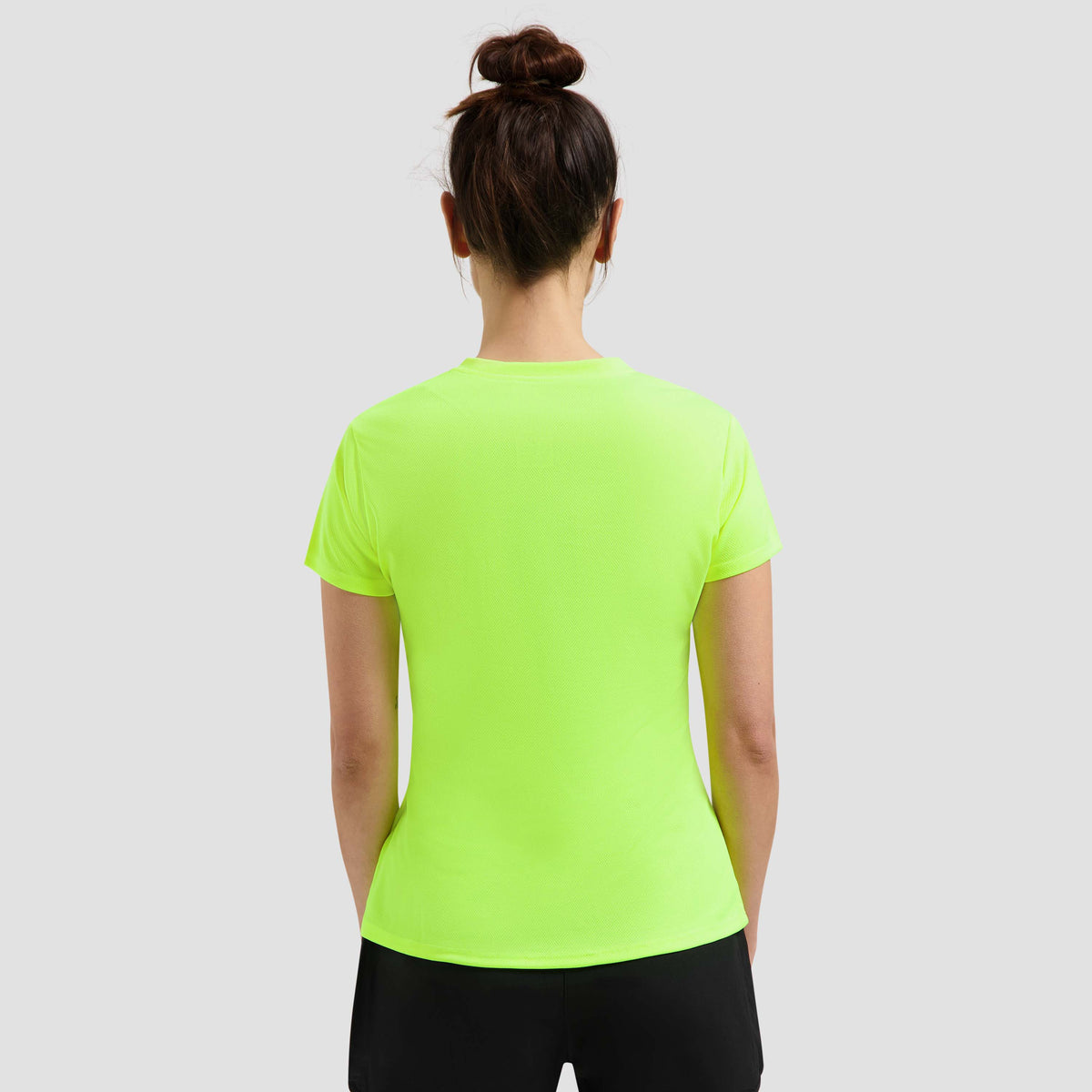 Rogelli Promo chemise Manches courtes Femme support fluoré.