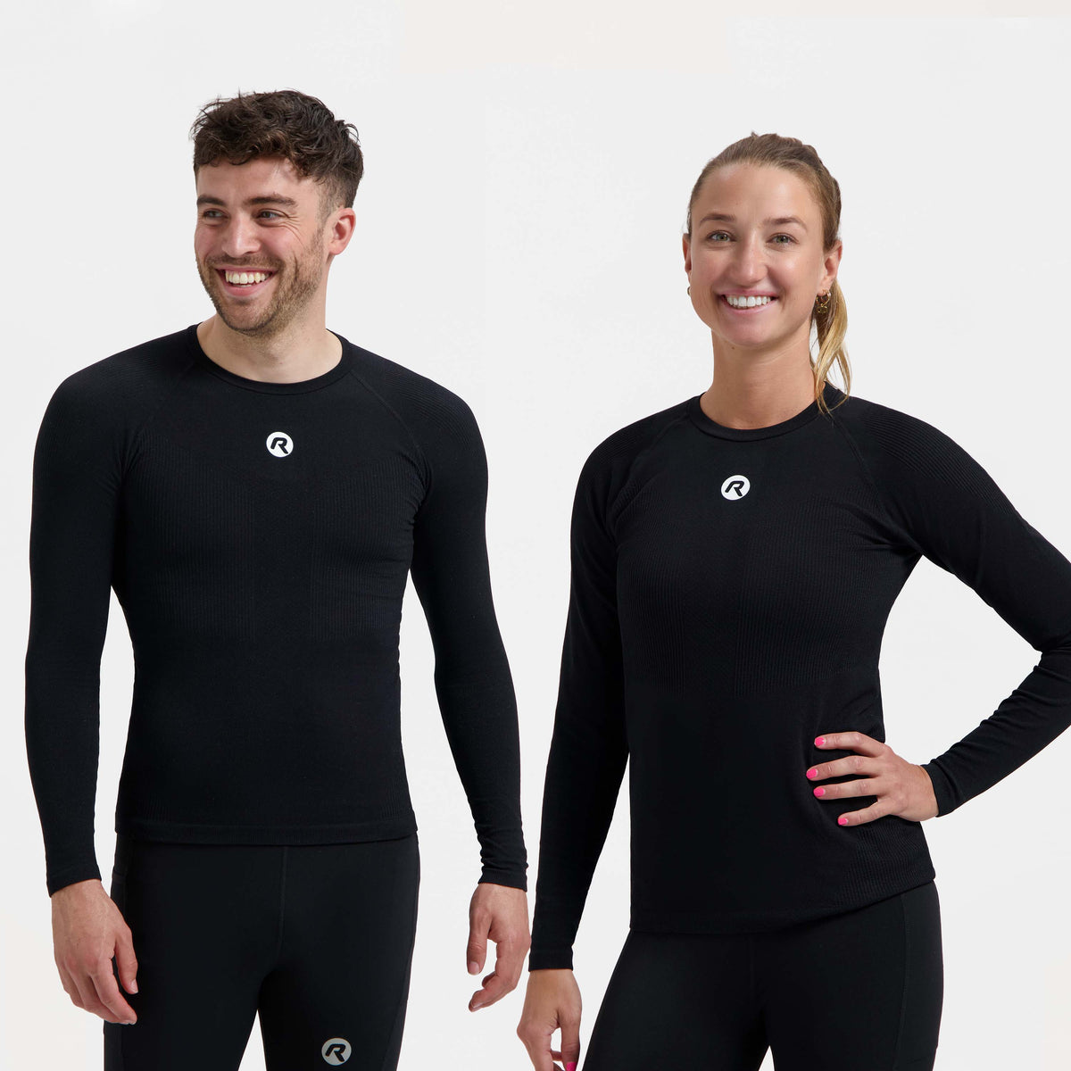 Man en vrouw in zwart Rogelli Core II ondershirt met lange mouwen als warme basislaag onder fietskleding.
