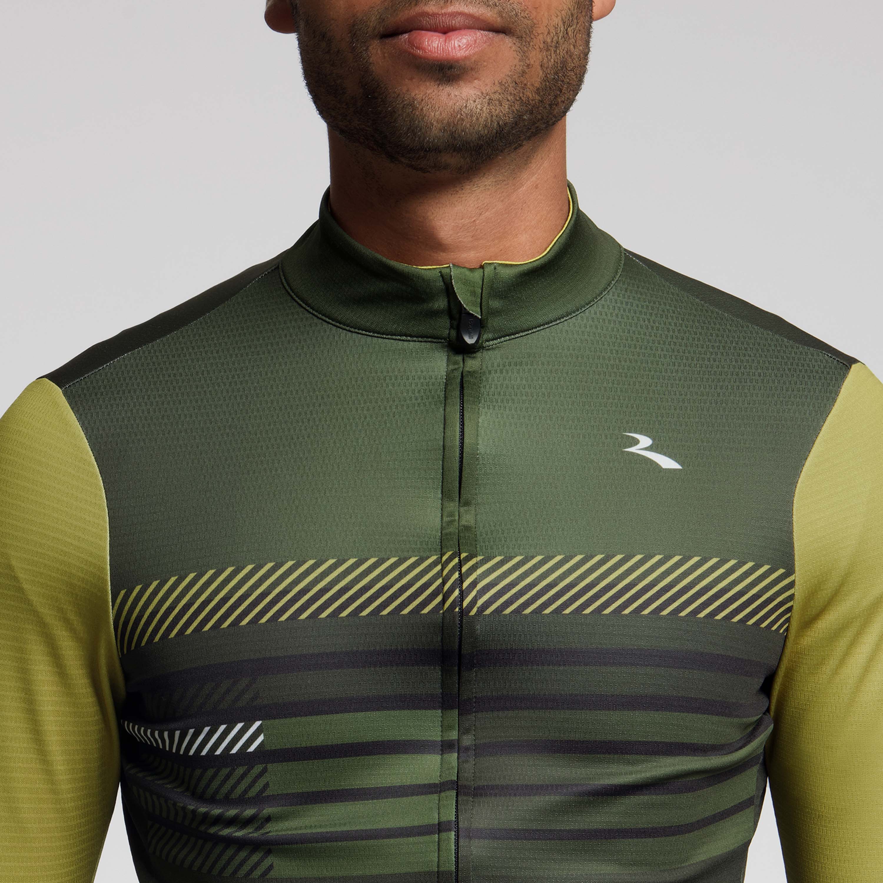 Detail van Rogelli Stryde fietsshirt L/S heren legergroen/mosterd voorkant. 