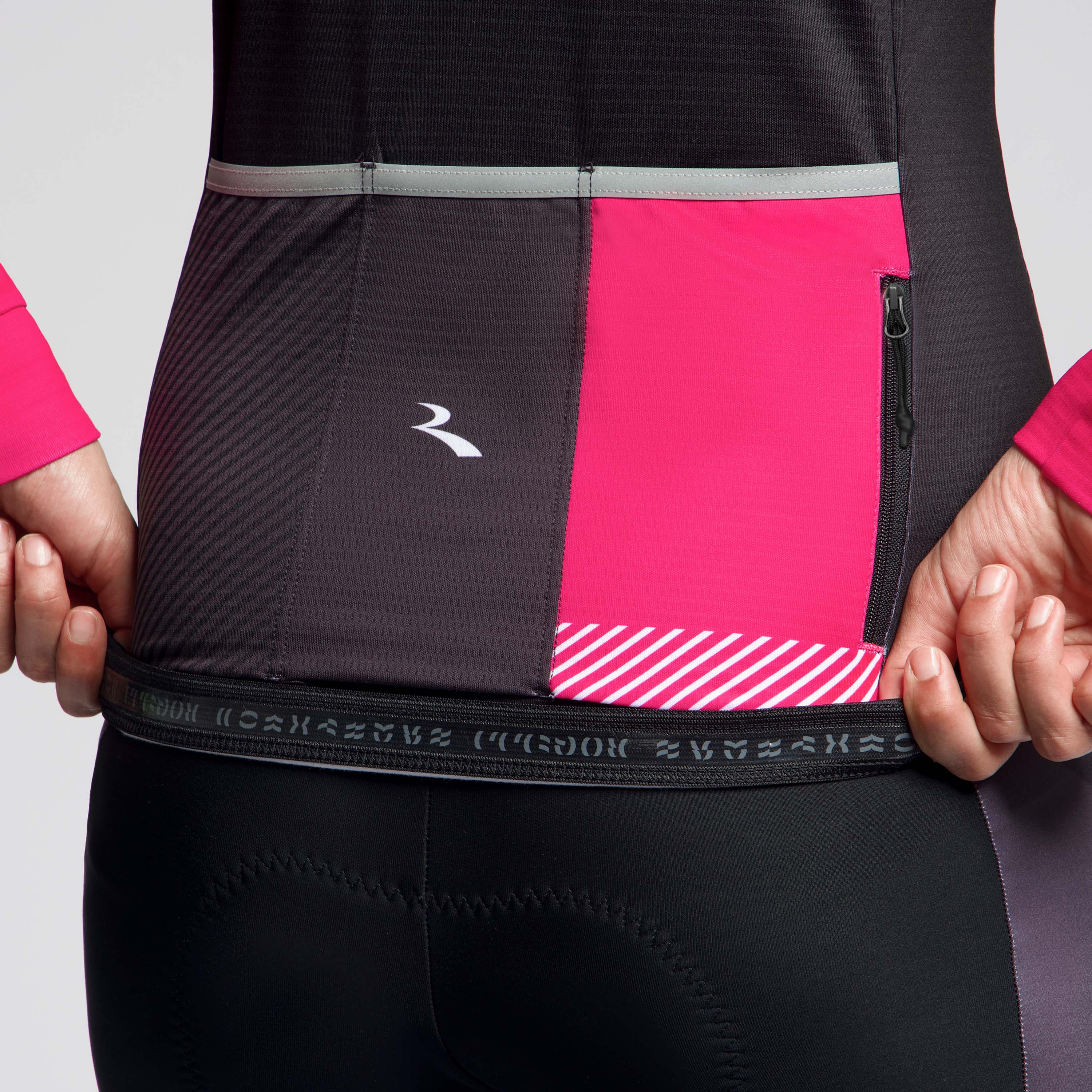 Detail van Rogelli Stryde fietsshirt L/S dames zwart/grijs/roze achterkant siliconen. 