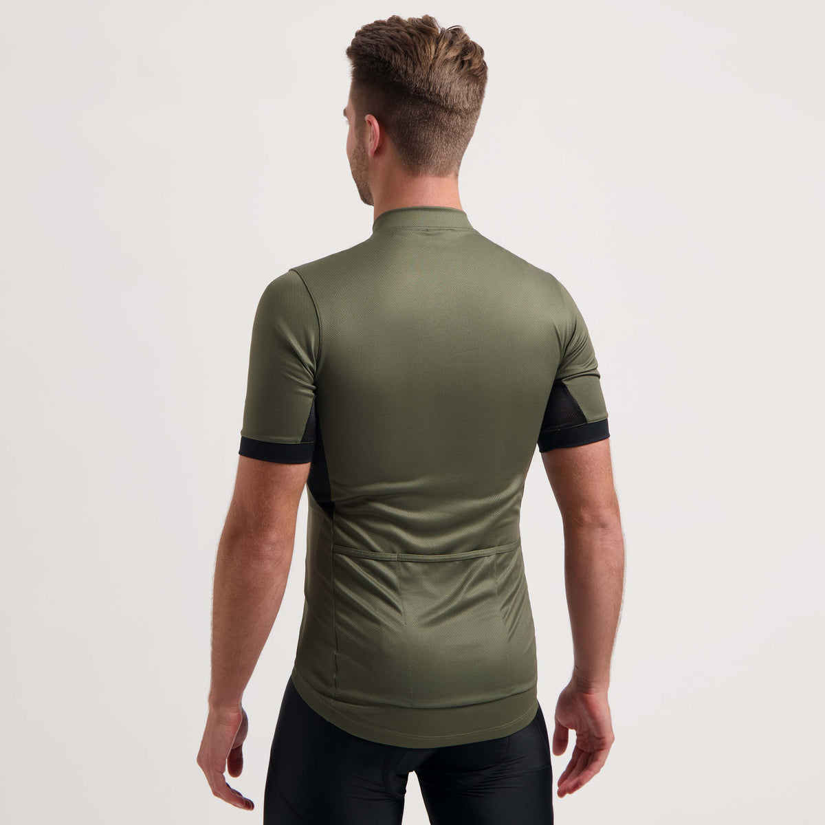 Rogelli Core fietsshirt heren groen korte mouw gedragen achterkant.